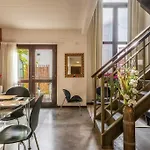 Enjoy Natural Light And Garden View Of This Loft