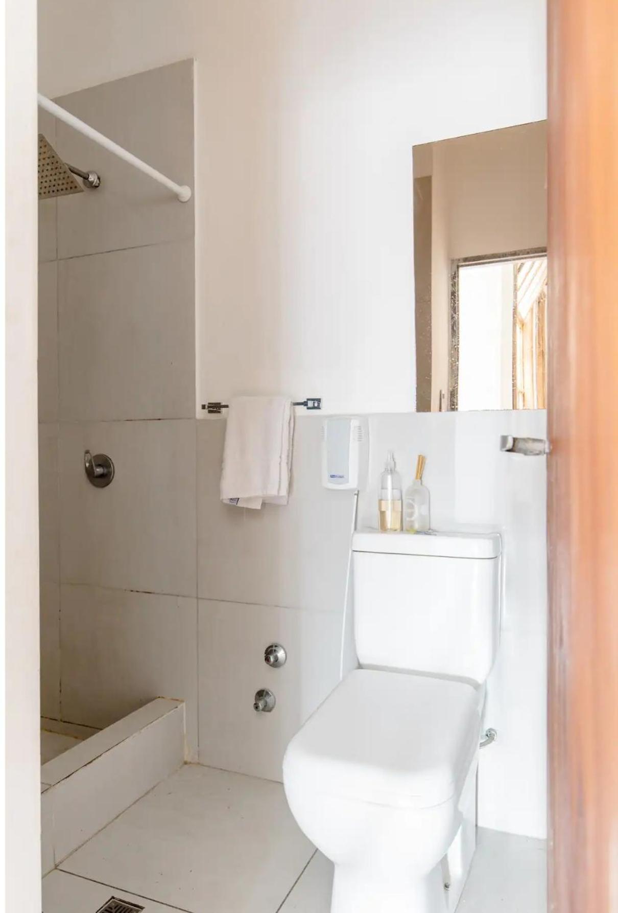 Estupenda Privada Deluxe Habitación en casa particular
