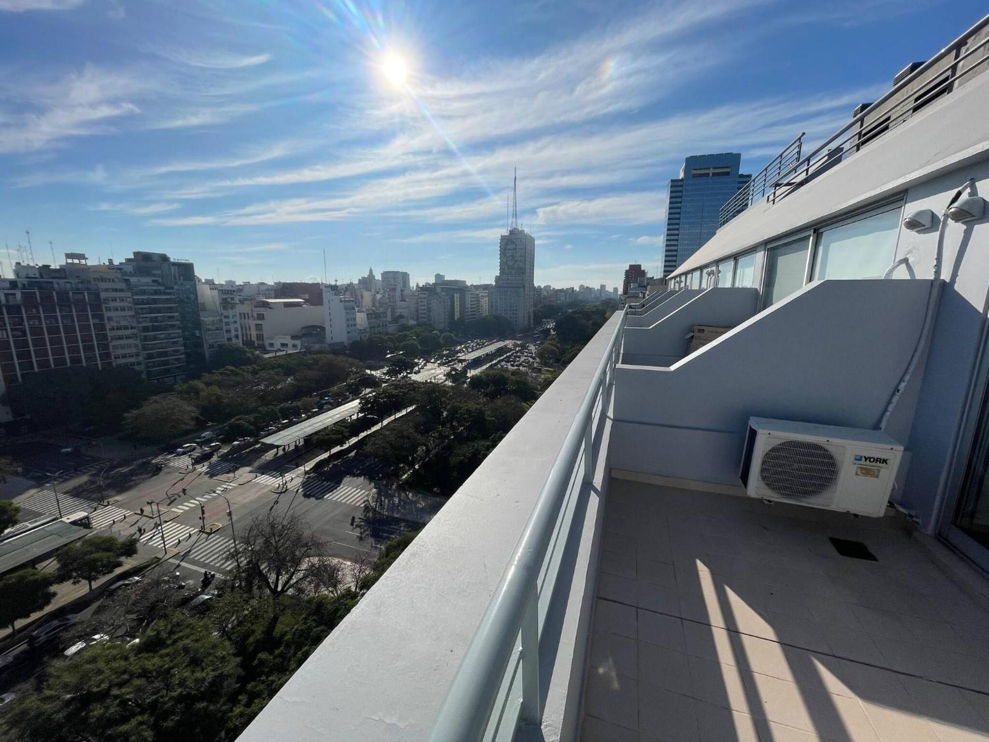 On 13th Floor Above 9 De Julio Avenue *