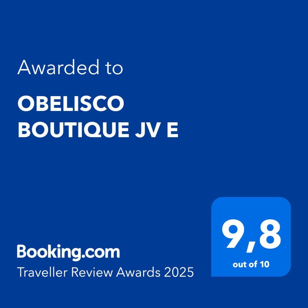 Obelisco Boutique Jv E *